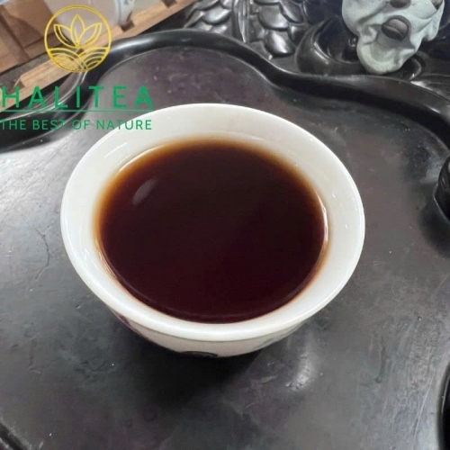 Trà Phổ Nhĩ Chín Hiệu Song Sư Hỉ Phúc 1999 Tại Việt Nam - Bánh 357g