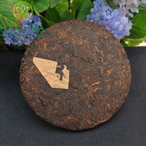 Trà Phổ Nhĩ Chín Mãnh Hải Trung Hoành Ấn Vàng – Bánh 357g