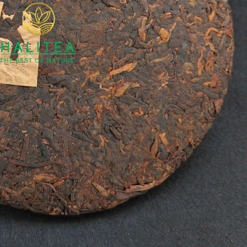 Trà Phổ Nhĩ Chín Mãnh Hải Trung Hoành Ấn Vàng – Bánh 357g