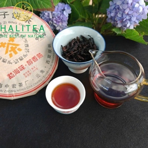 Trà Phổ Nhĩ Chín Mãnh Hải Trung Hoành Ấn Vàng – Bánh 357g