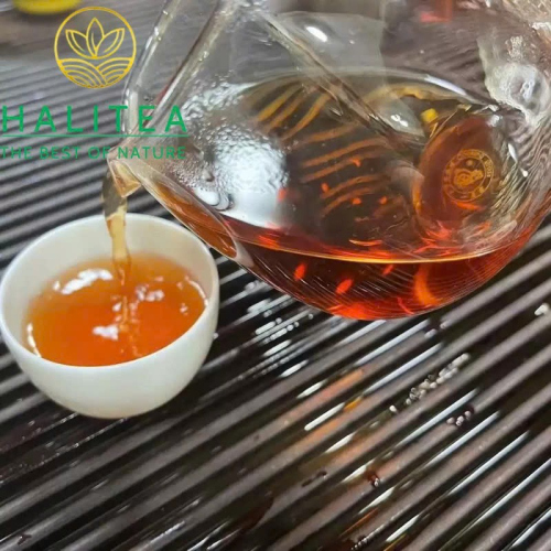 Trà Phổ Nhĩ Sống Đại Ích Trà Vương Thanh Bính 2002 – Mãnh Hải 357g