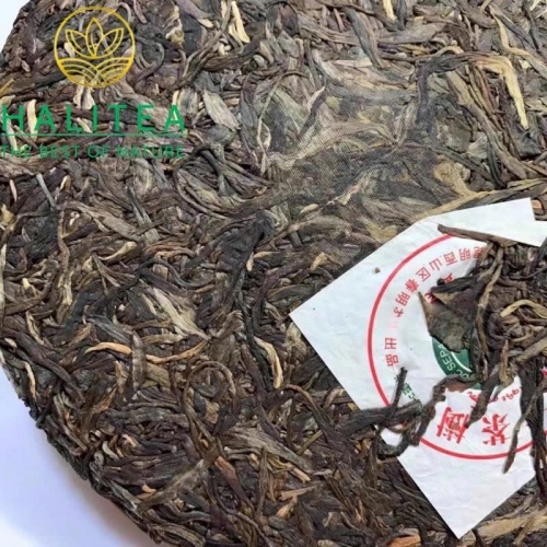 Trà Phổ Nhĩ Sống Lão Ban Chương Hữu Cơ 2004 Đại Bạch Thái – Bánh 357g