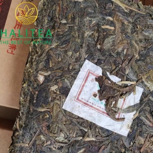 Trà Phổ Nhĩ Sống (Lao Tong Zhi) Lão Đồng Chí Gia Gia 2006 – Gạch 250g