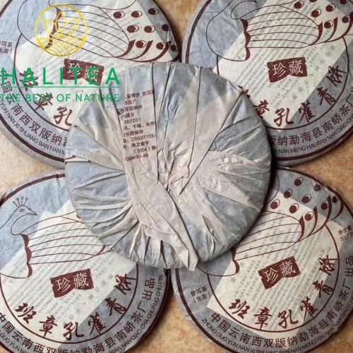 Trà Phổ Nhĩ Sống Nam Kiều Ban Chương Khổng Tước 2006 – Bánh 357g