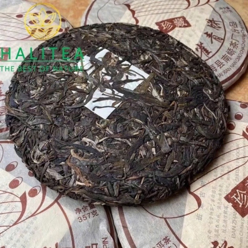 Trà Phổ Nhĩ Sống Nam Kiều Ban Chương Khổng Tước 2006 – Bánh 357g