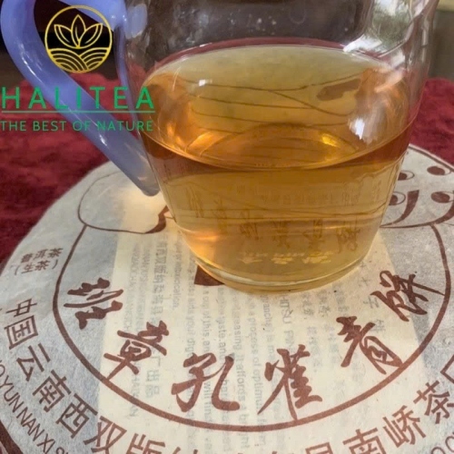 Trà Phổ Nhĩ Sống Nam Kiều Ban Chương Khổng Tước 2006 – Bánh 357g