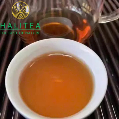 Trà Phổ Nhĩ Sống Tử Đại Ích 2002 Thanh Bính 7542 Bánh 357g